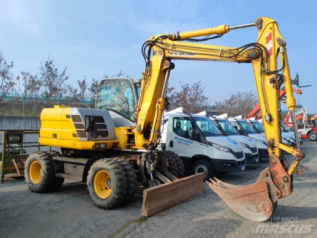 New Holland MH 3.6 حفارات بعجل