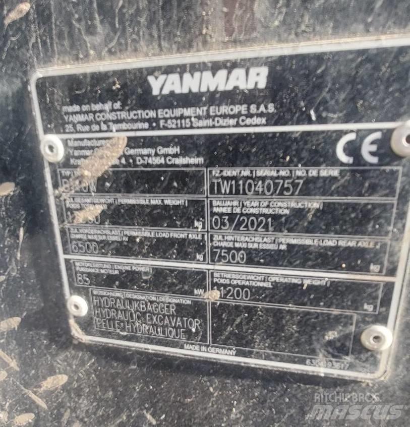 Yanmar B 110 W حفارات بعجل