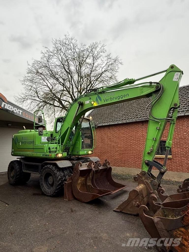 Hyundai R140W-9 حفارات بعجل