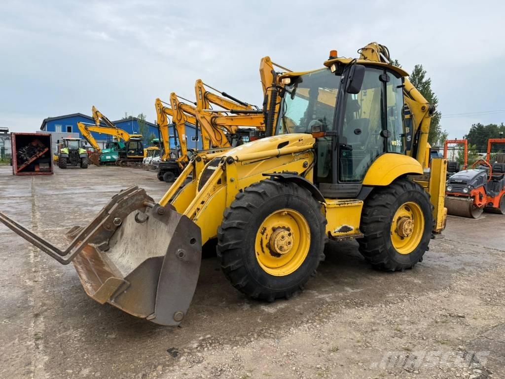 Komatsu WB 93 S-5 لوادر ذات جرافات عكسية