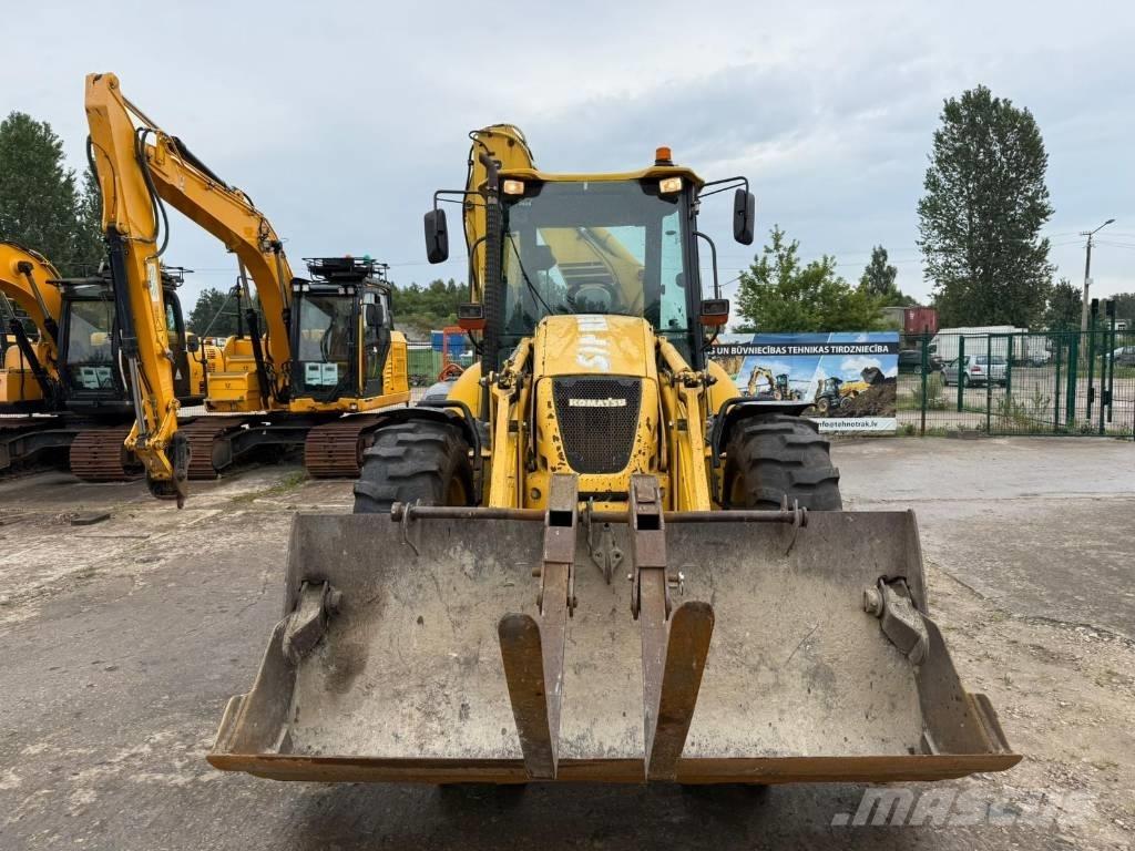 Komatsu WB 93 S-5 لوادر ذات جرافات عكسية