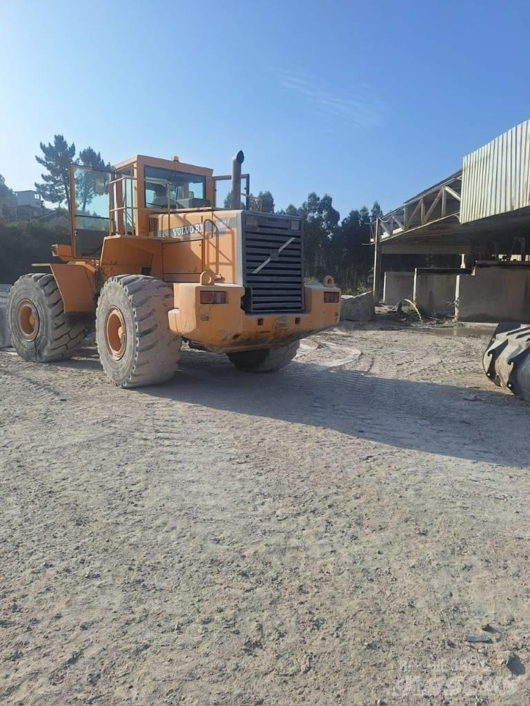 Volvo L 180 C لوادر بعجل