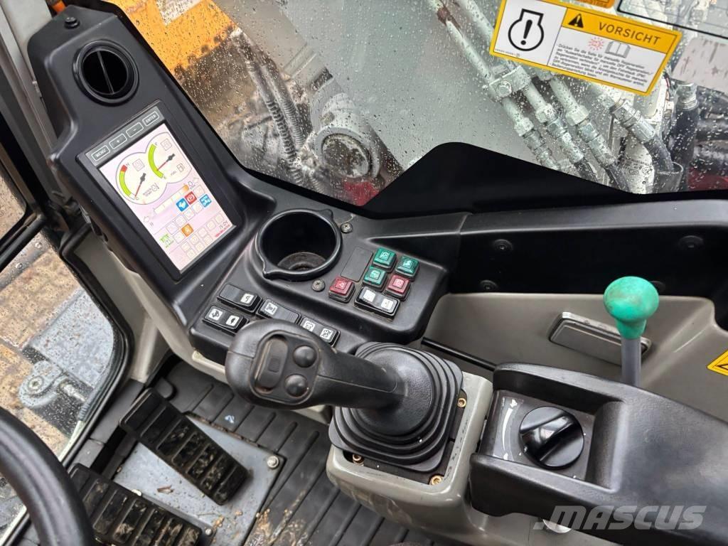 Takeuchi TB 1160 W حفارات بعجل