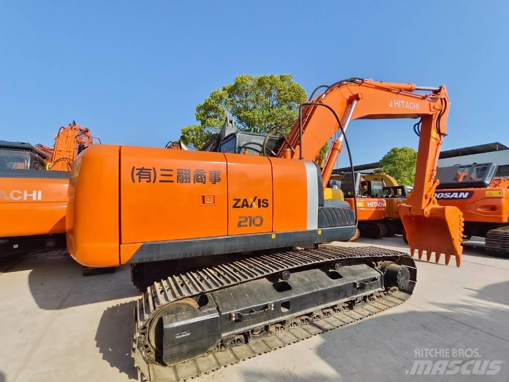 Hitachi ZX 210 حفارات زحافة