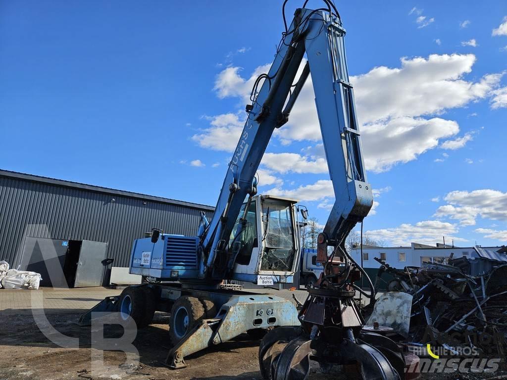 Fuchs MHL 320 حفارات بعجل