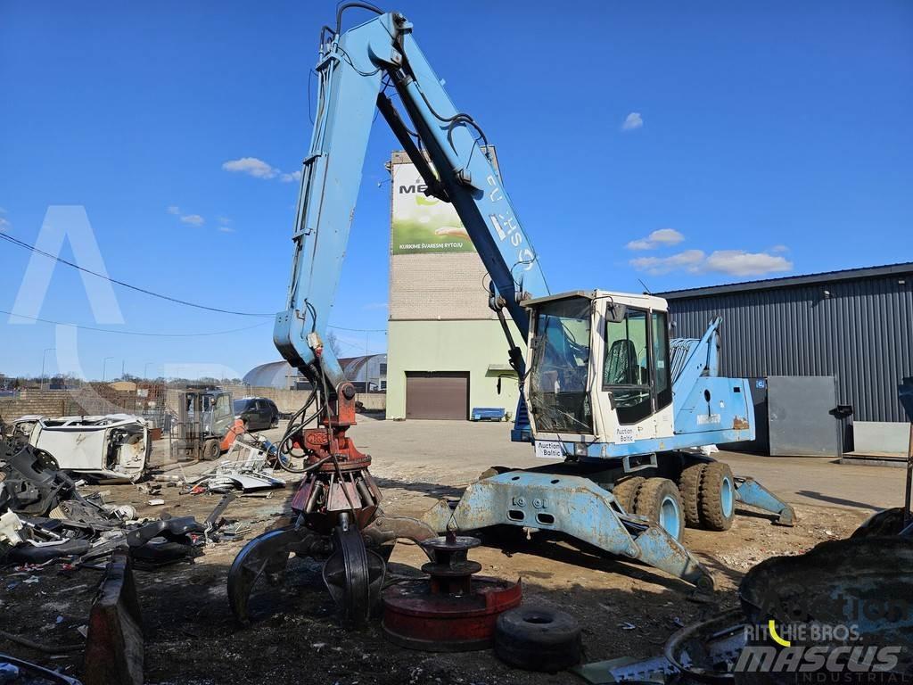 Fuchs MHL 320 حفارات بعجل