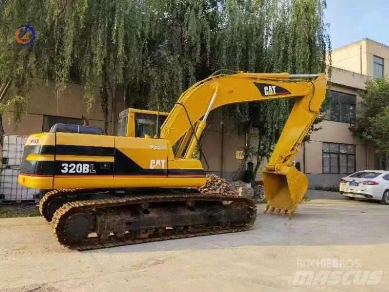 CAT 320 B L حفارات زحافة