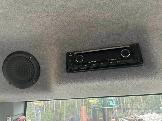 CAT M 314 F حفارات بعجل