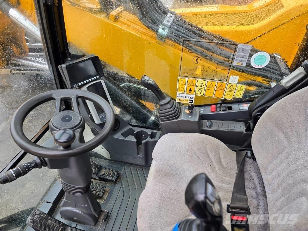 CAT M 315 F حفارات بعجل
