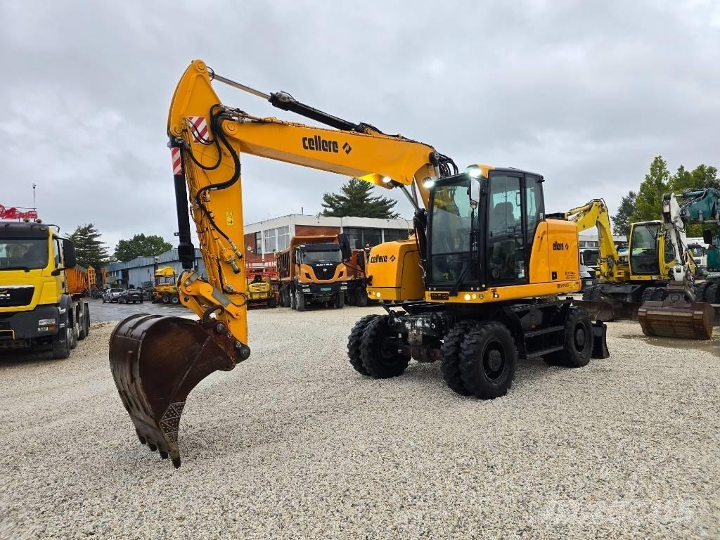 CAT M 315 F حفارات بعجل