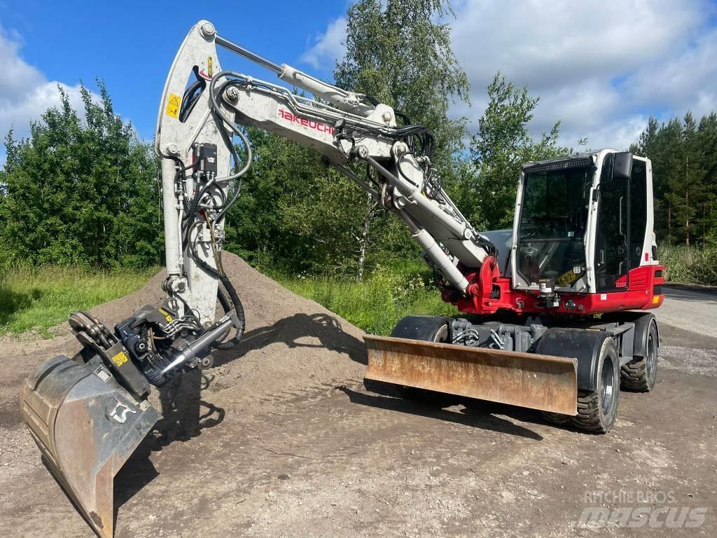 Takeuchi 395W حفارات بعجل