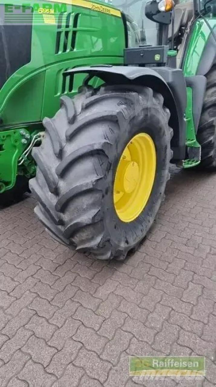 John Deere 6195m الجرارات