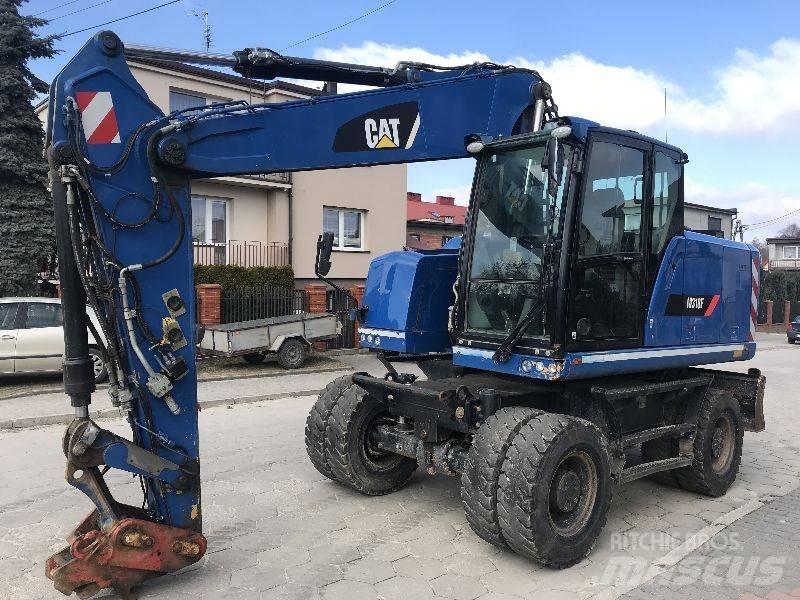 CAT M318f 318 f حفارات بعجل