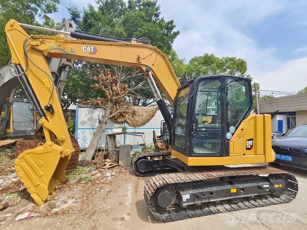 CAT 310 حفارات زحافة