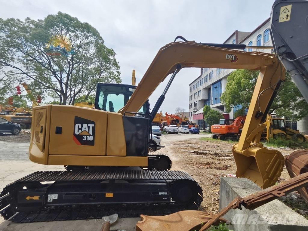CAT 310 حفارات زحافة