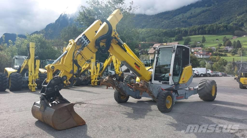 Menzi Muck M520 حفارات بعجل