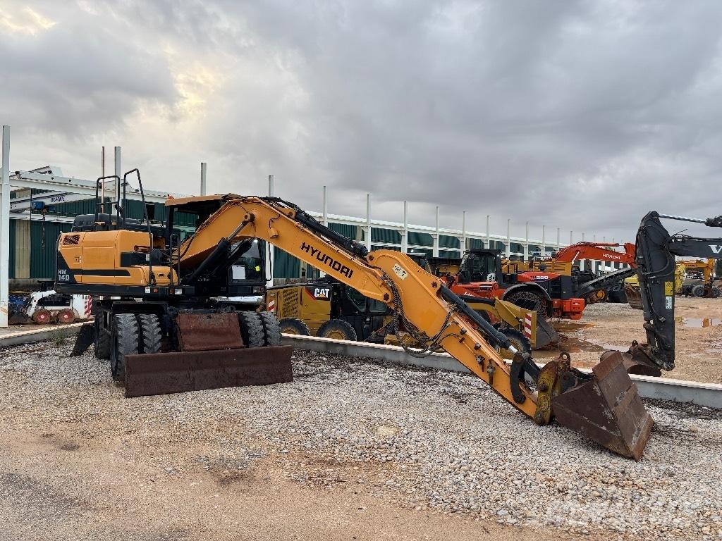 Hyundai HW 140 A حفارات بعجل