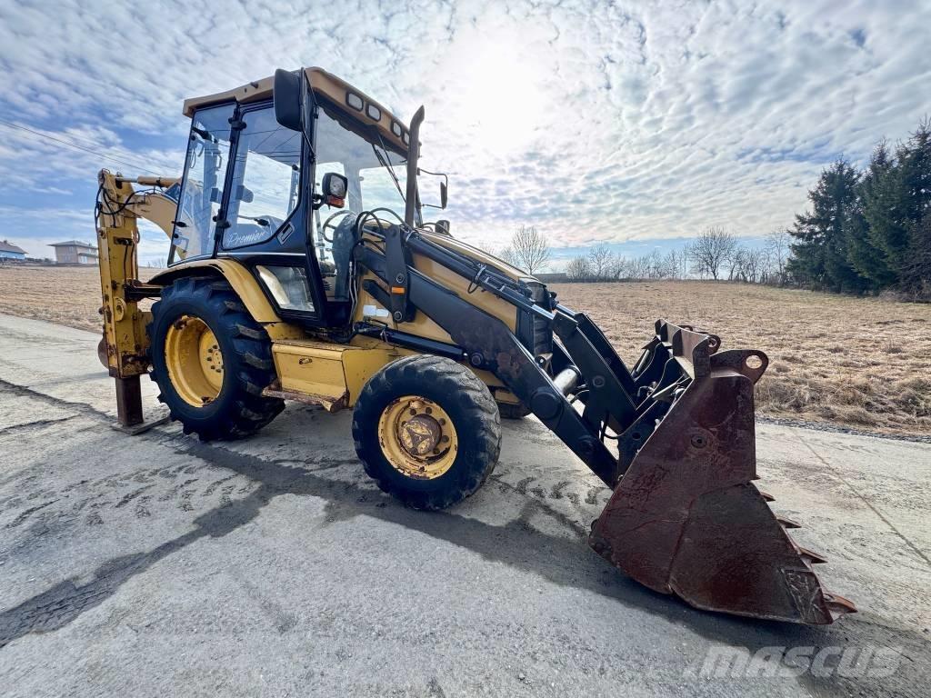 CAT 428 C لوادر ذات جرافات عكسية