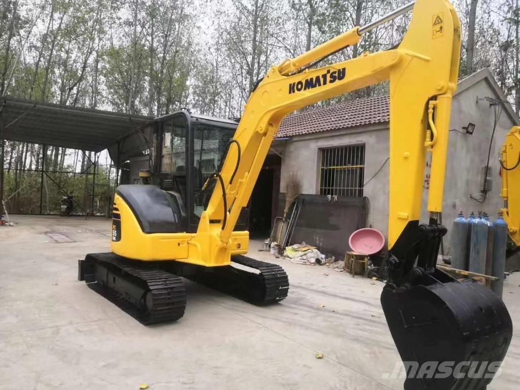 Komatsu PC 55 حفارات زحافة