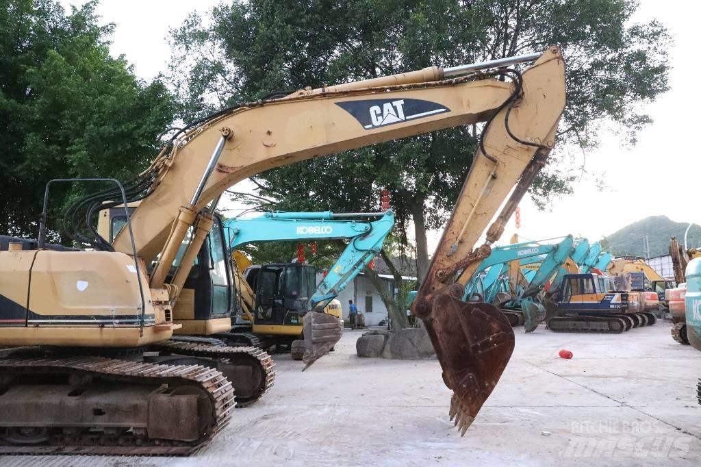 CAT 320BU حفارات زحافة