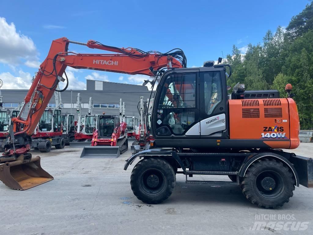 Hitachi ZX 140 W-6 حفارات بعجل