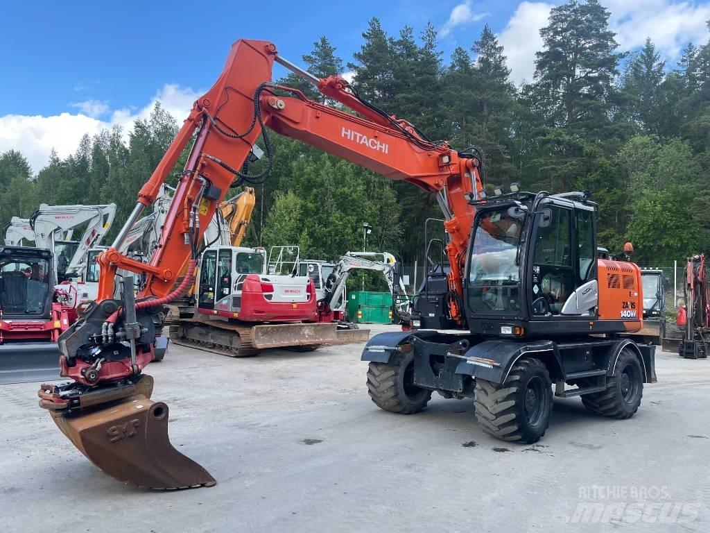 Hitachi ZX 140 W-6 حفارات بعجل