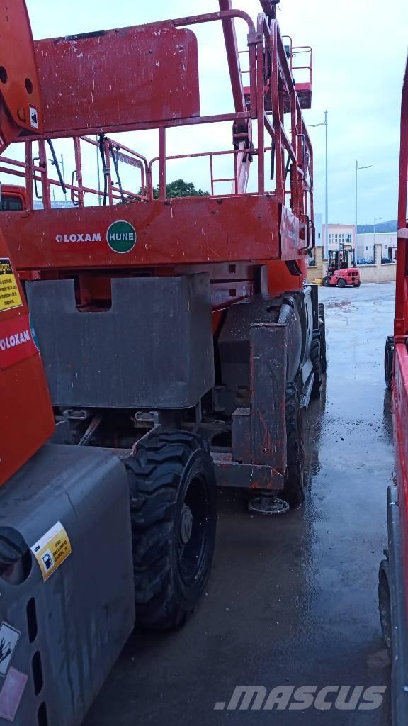 JLG 4394 RT رافعات مقصية الشكل