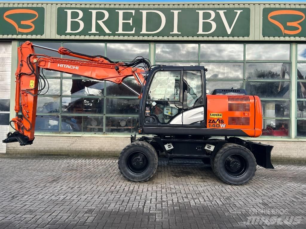 Hitachi ZX 140 W-5B حفارات بعجل