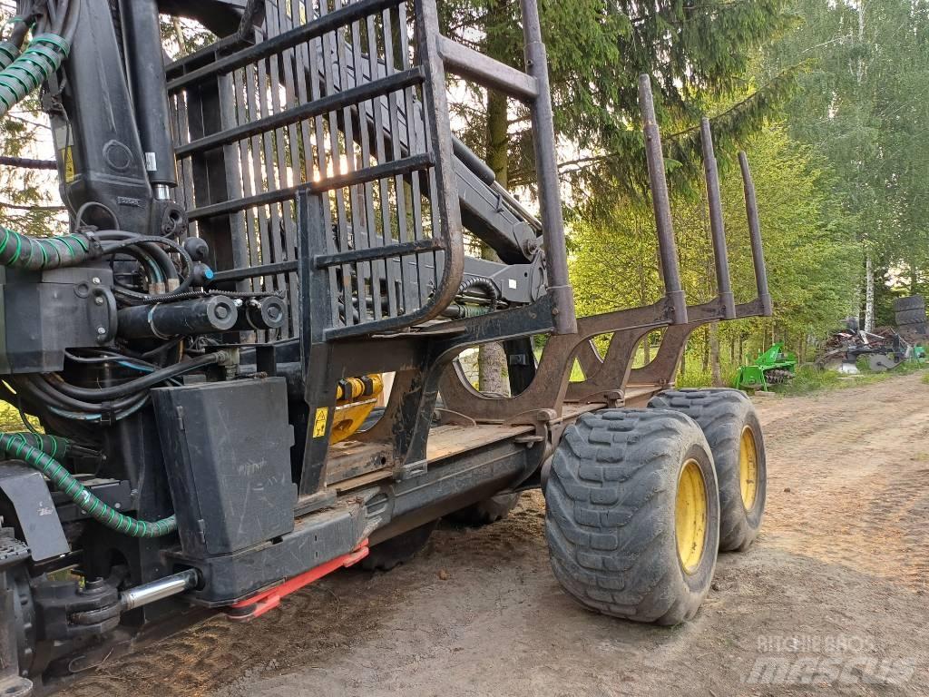 John Deere 1010E شاحنات