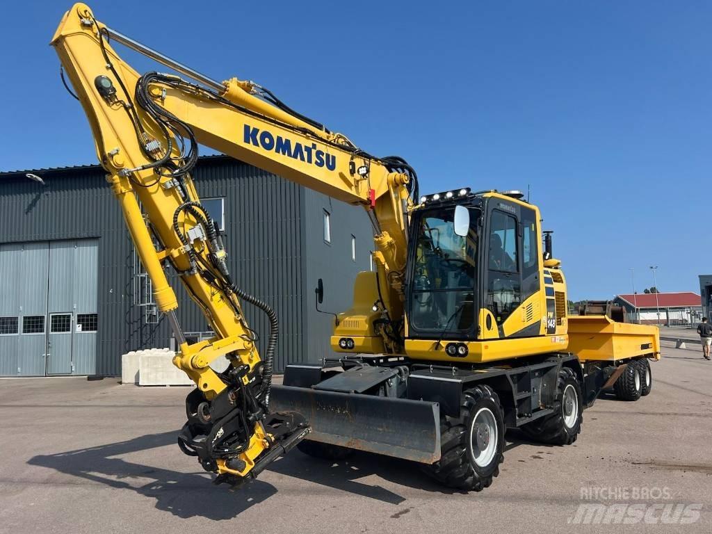 Komatsu PW148-11 حفارات بعجل