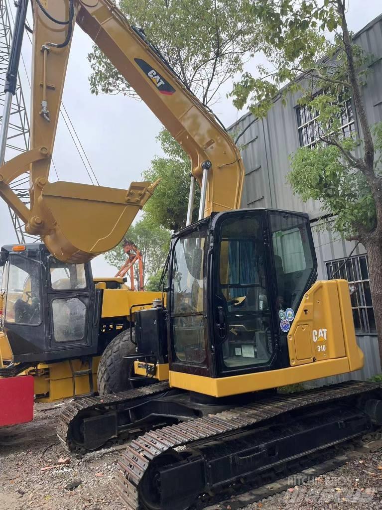 CAT 310 حفارات زحافة