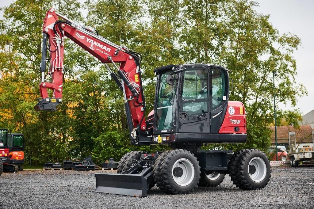 Yanmar B 75 W حفارات بعجل