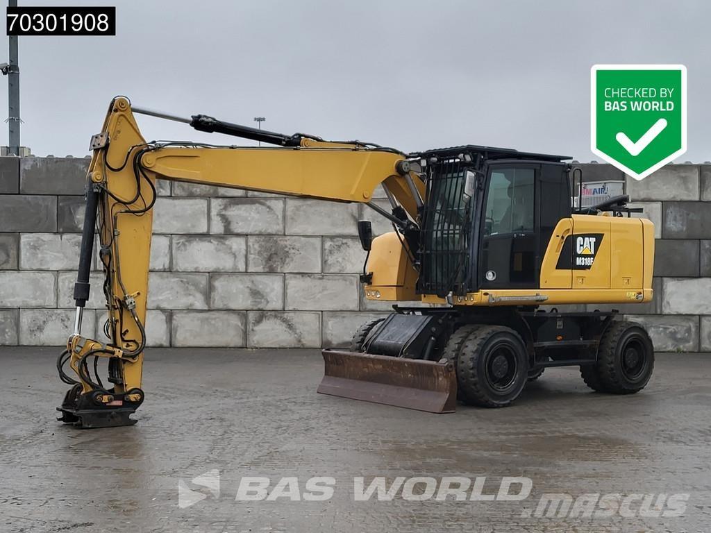 CAT M318 F حفارات بعجل