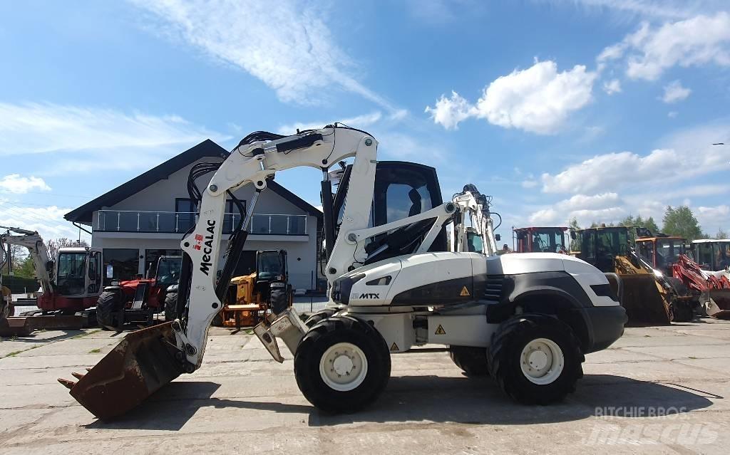 Mecalac 12 M TX حفارات بعجل