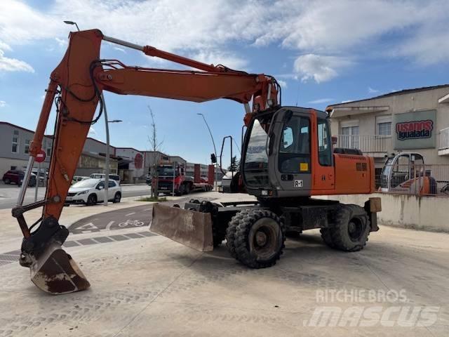 Hitachi ZX 160 W حفارات بعجل
