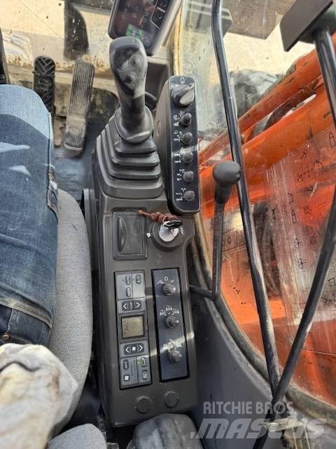 Hitachi ZX 160 W حفارات بعجل