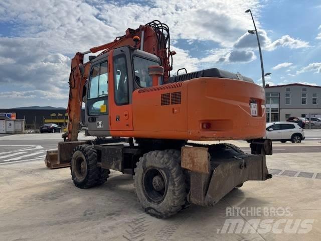 Hitachi ZX 160 W حفارات بعجل