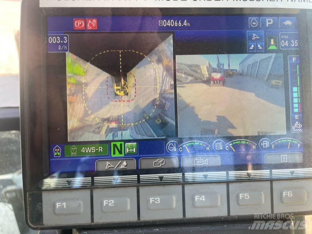 Komatsu PW118-11 حفارات بعجل