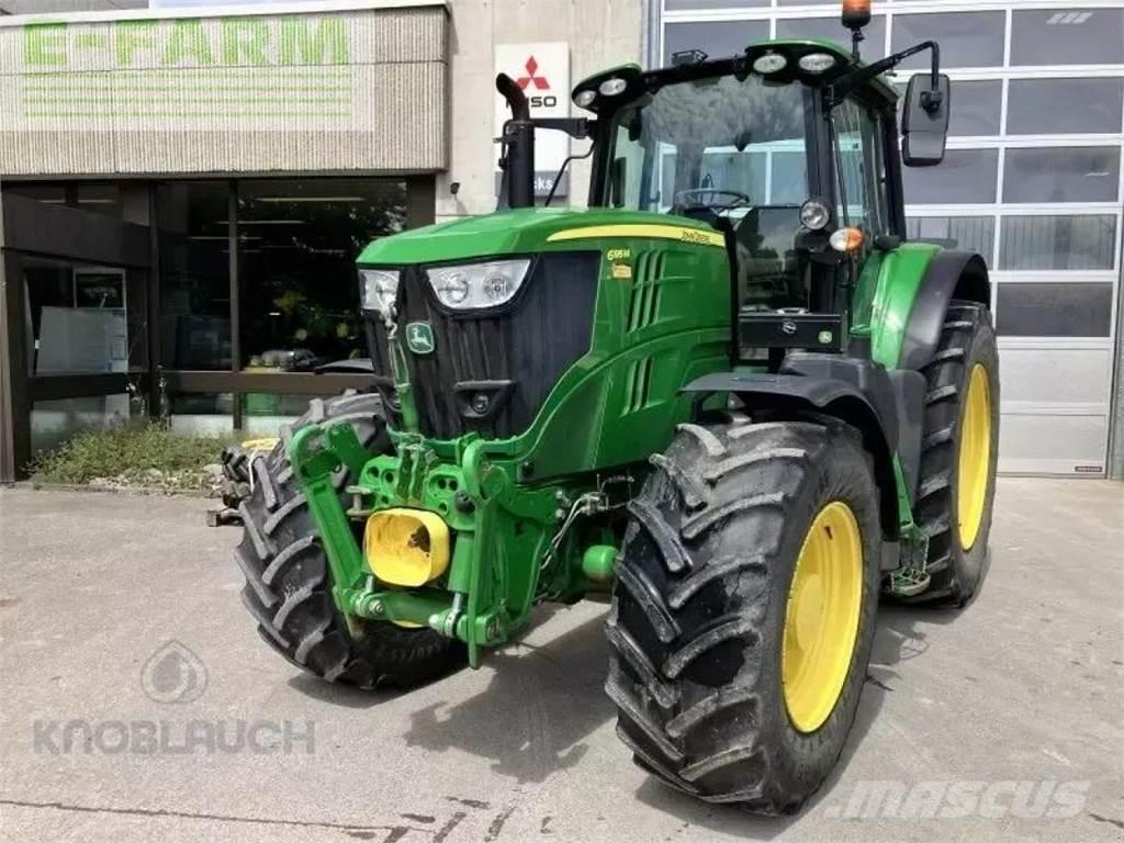 John Deere 6195m الجرارات