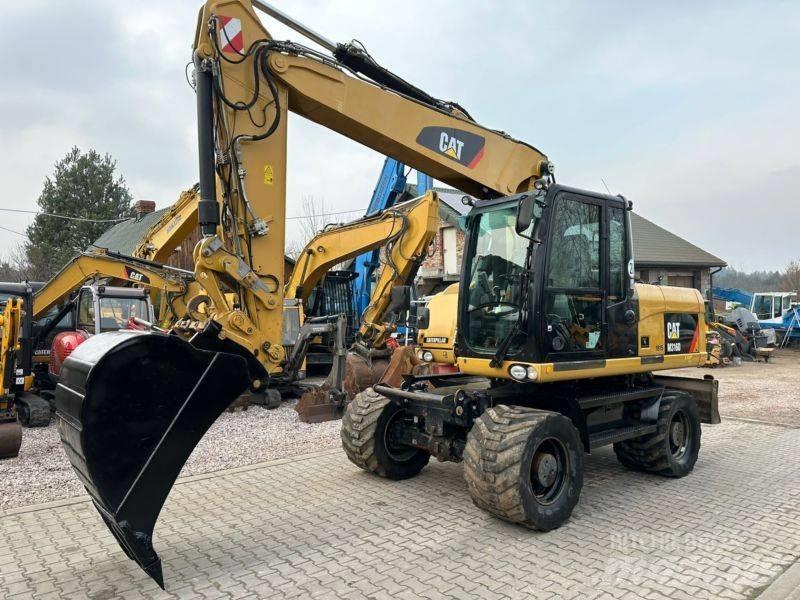 CAT CAT M316D حفارات بعجل