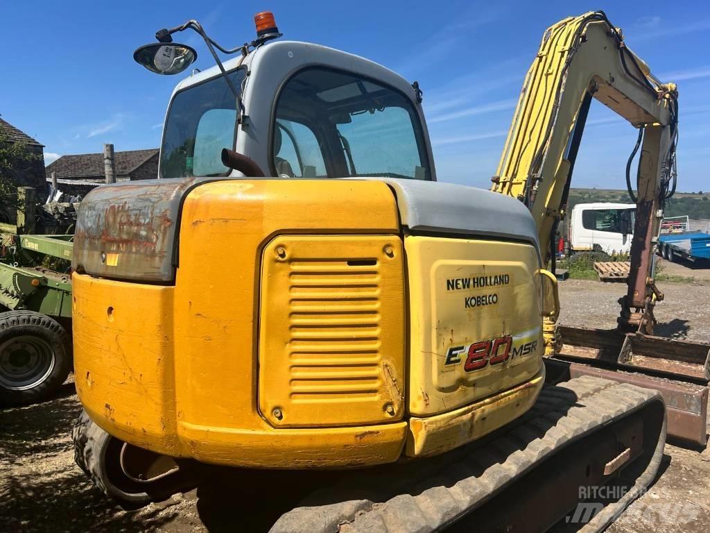 New Holland E 80 حفارات وسط 7 طن - 12 طن