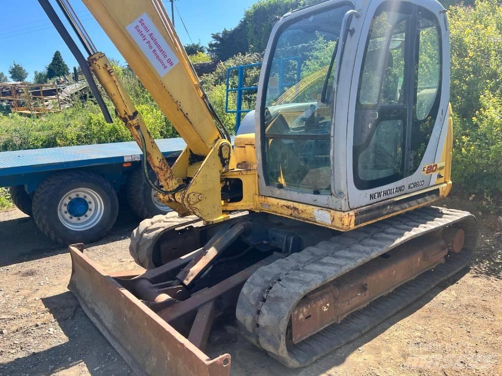 New Holland E 80 حفارات وسط 7 طن - 12 طن