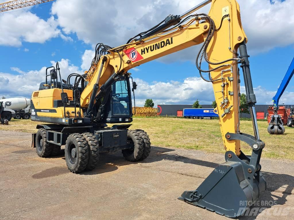 Hyundai HW140 حفارات بعجل
