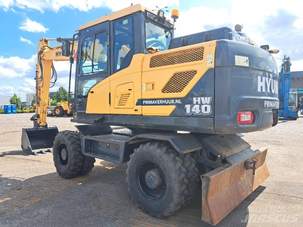 Hyundai HW140 حفارات بعجل