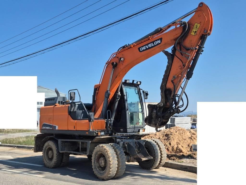 Doosan DX 140 W-5 حفارات بعجل