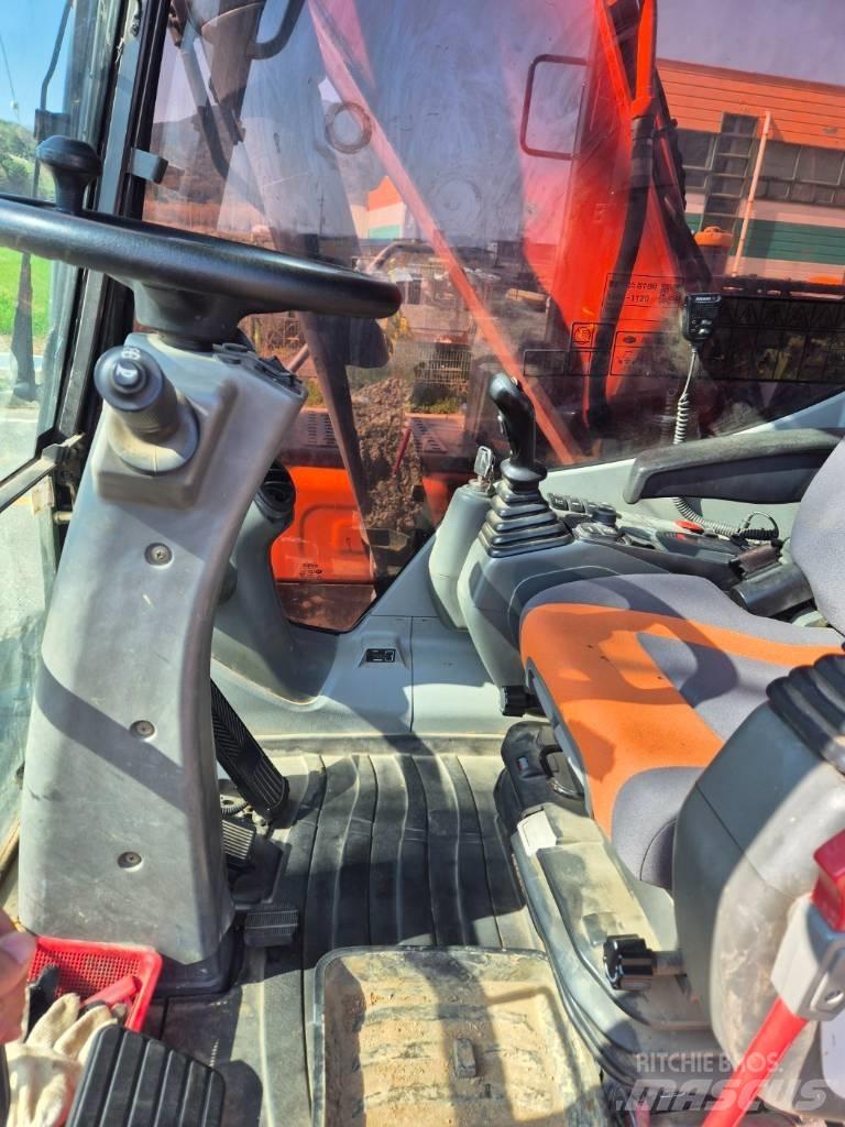 Doosan DX 140 W-5 حفارات بعجل