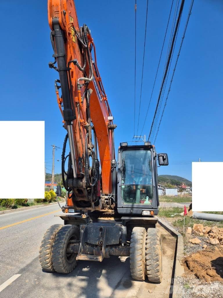 Doosan DX 140 W-5 حفارات بعجل