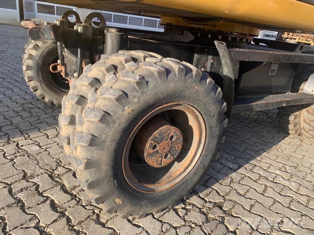 CAT M 316 D حفارات بعجل