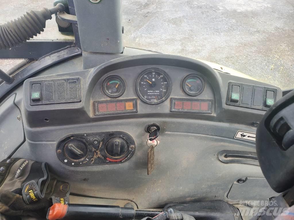 New Holland LB 75 حفارات بعجل