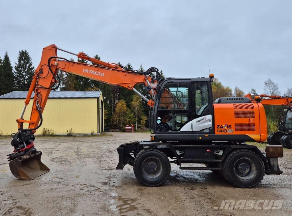 Hitachi ZX 140 W T-5 حفارات بعجل